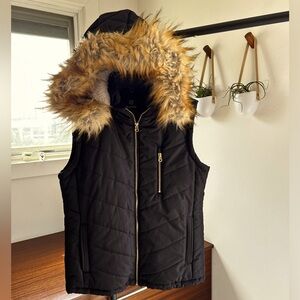 Winter puffer vest with faux fur cap